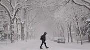 man walking in snow