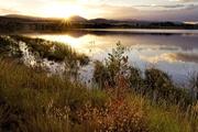 rural lake at sunset