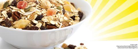 bowl of whole grains with sun rays behind it image