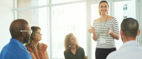 Woman leading class or small group discussion
