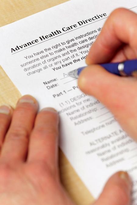 hands with advance care document